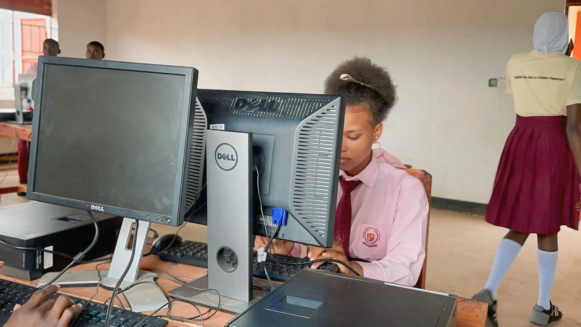 A student developing computer skills in the AMEF ICT classroom