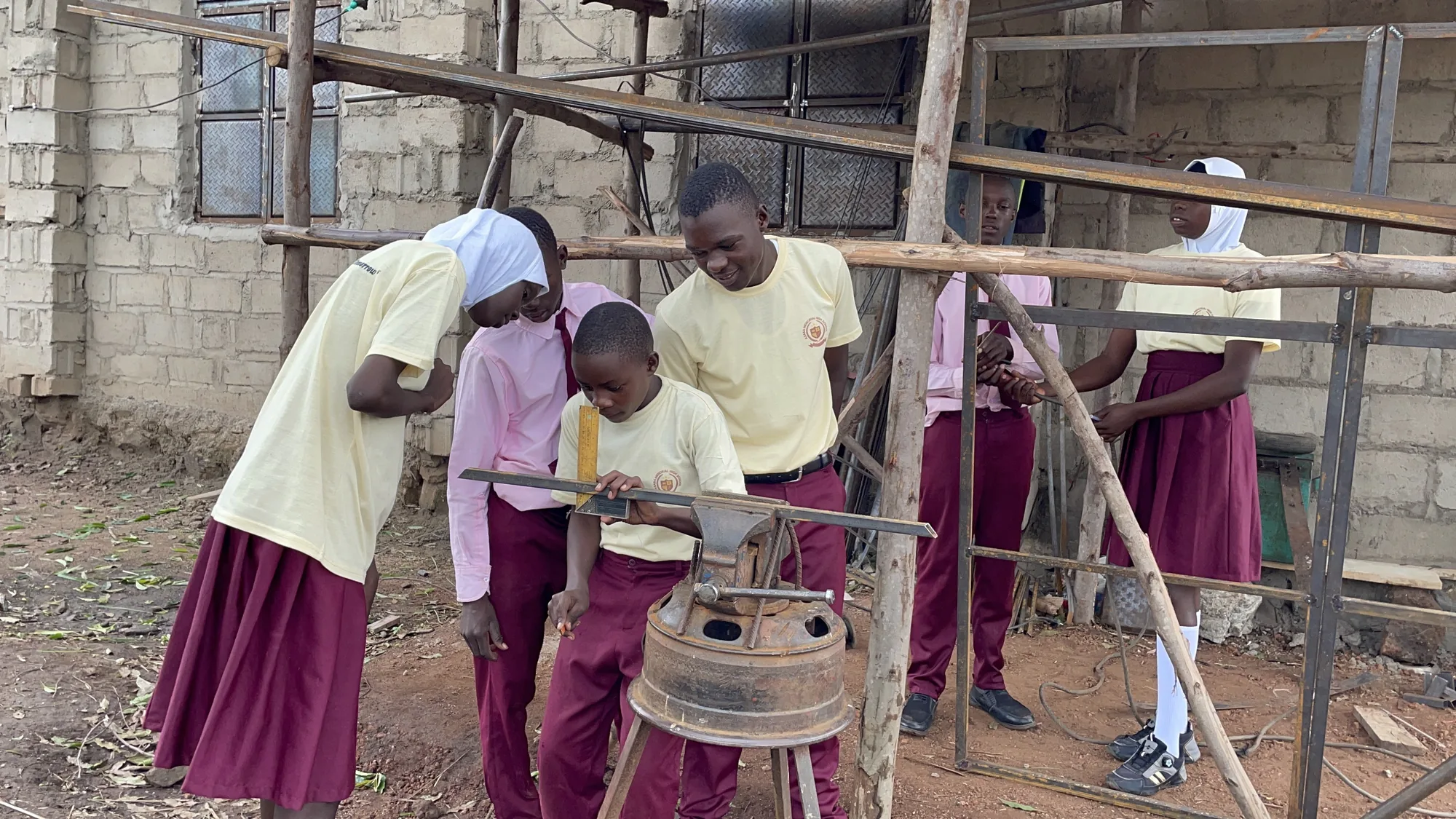 Young people taking part in practical welding training
